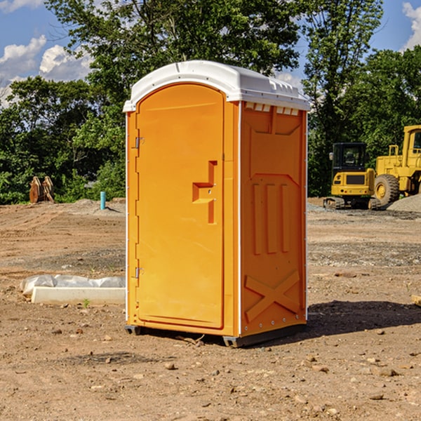 how often are the portable restrooms cleaned and serviced during a rental period in Urbana